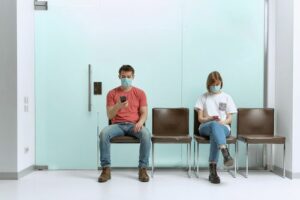 Patients in waiting room concept of preparing for injury doctor appointment