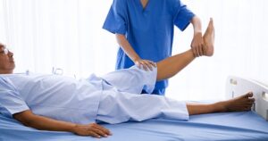 A physical therapist treating a drunk driving accident victim