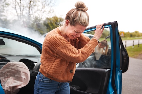 Woman Injured After Car Accident - Can A Car Accident Make an Old Injury Worse