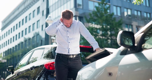 Man With Injured Neck After Car Accident - Neck vs Back Injuries