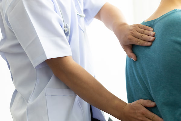 Car Accident Pain Management Specialist Helps Man With Back Pain