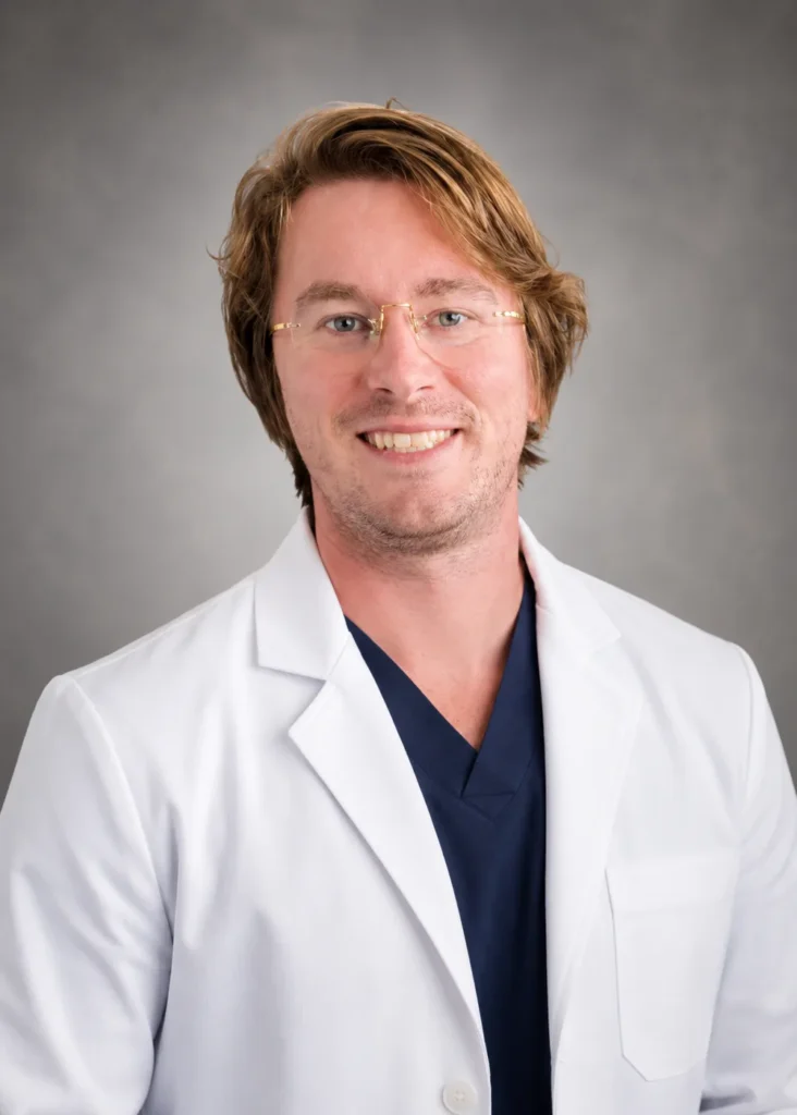 Dr. Christian Holliday