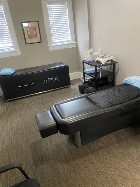 Room with 2 chiropractic tables
