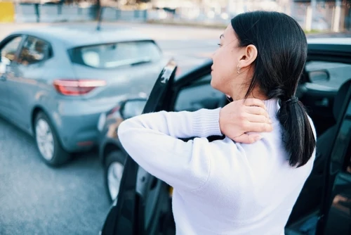 A driver suffering neck pain from whiplash needs a car accident doctor. 
